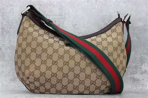 gucci canvas leather sling bag|gucci sling bag price.